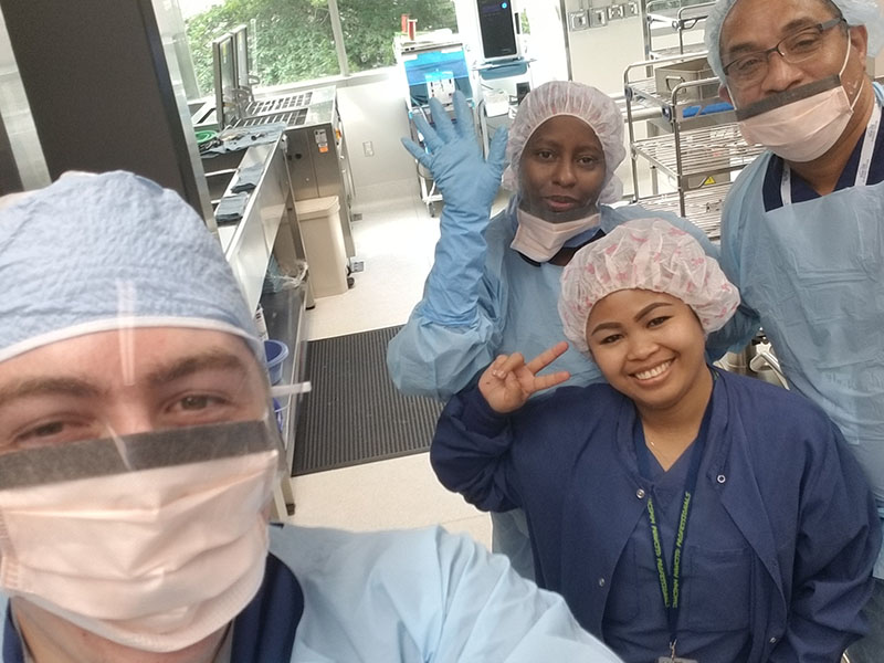 Edi Bala (lower right) in a lab class